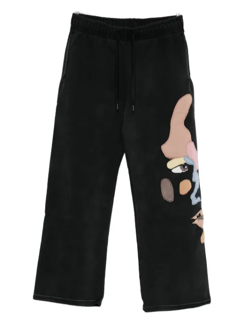 KidSuper motif-appliqué trousers