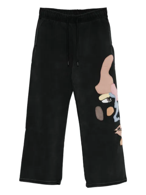 KidSuper motif-appliqué trousers
