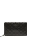 CHANEL Pre-Owned 2014 CC Quilted Lambskin Zip Around Wallet long wallets - Black