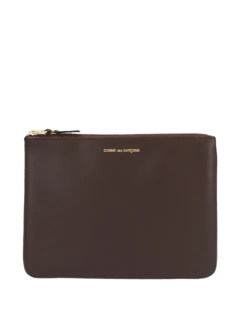 Comme Des Garçons cartera en relieve