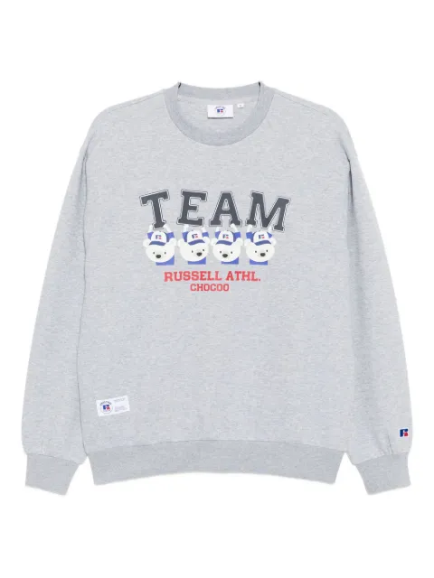CHOCOOLATE playera con estampado gráfico en colaboración con  Russell Athletic