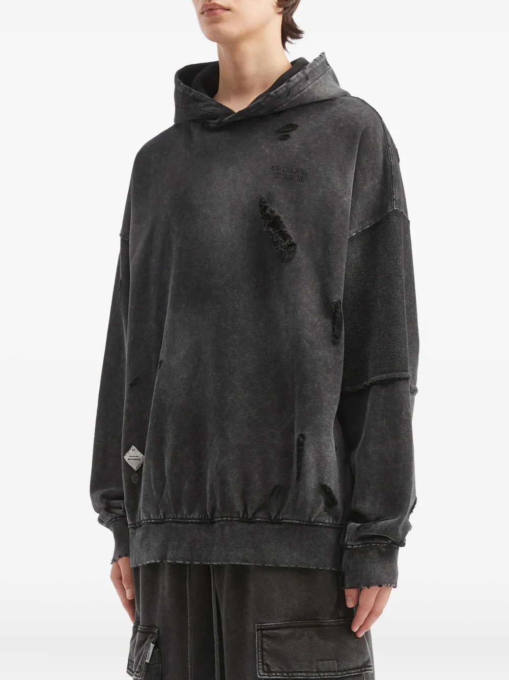 Musium Div. Gerafelde sweater met vlakken Zwart