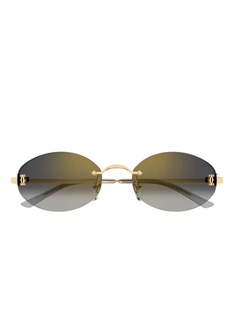 Cartier Eyewear lentes de sol con armazón redonda y detalle del logo