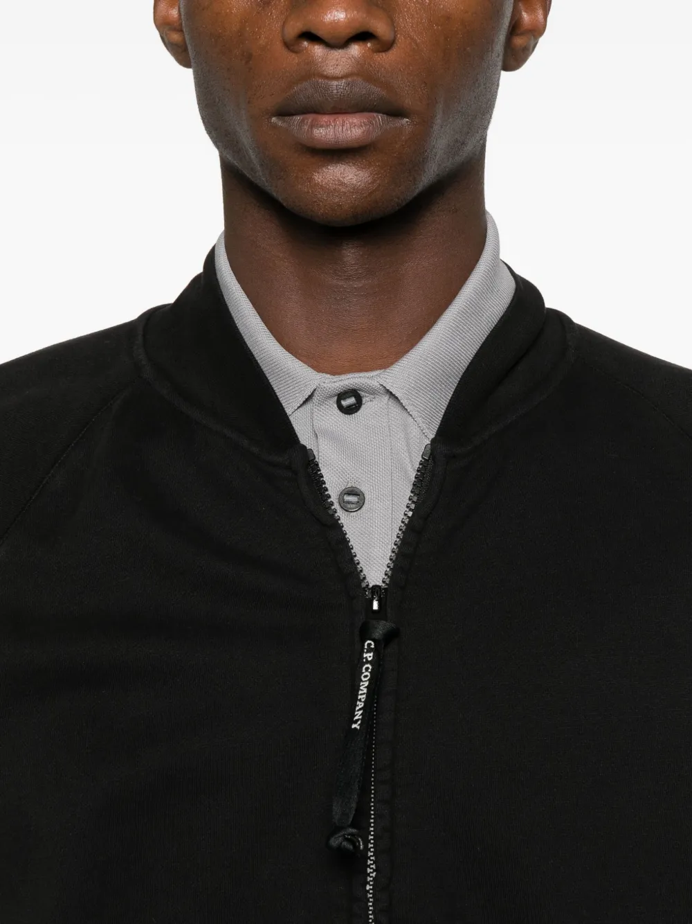 C.P. Company Bomberjack met Lens-zak Zwart