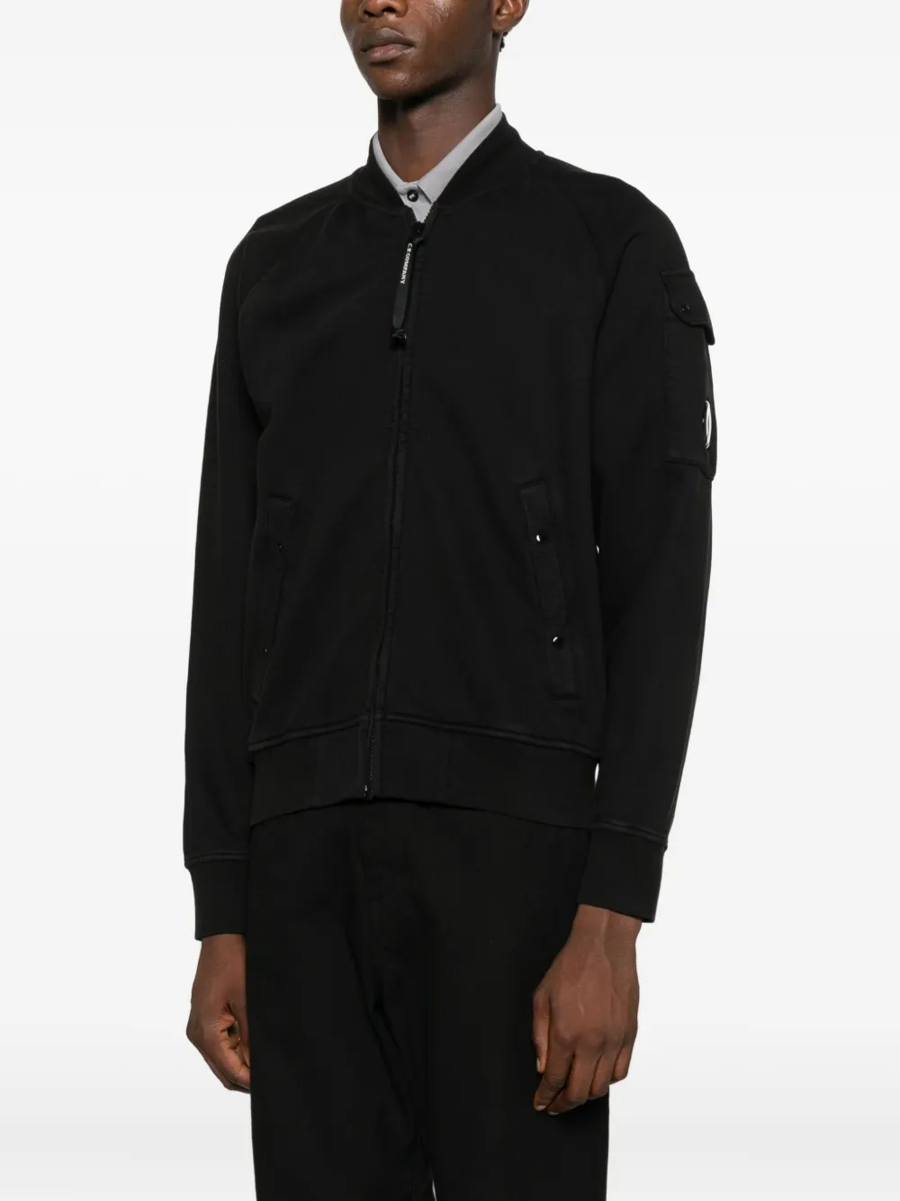C.P. Company Bomberjack met Lens-zak Zwart