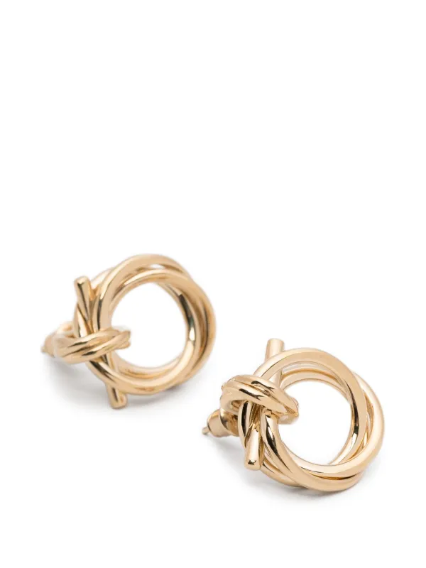 Ferragamo ツイスト ガンチーニ ピアス | ゴールドトーン | FARFETCH JP