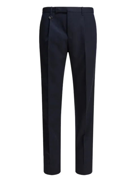 Prada triangle-logo trousers