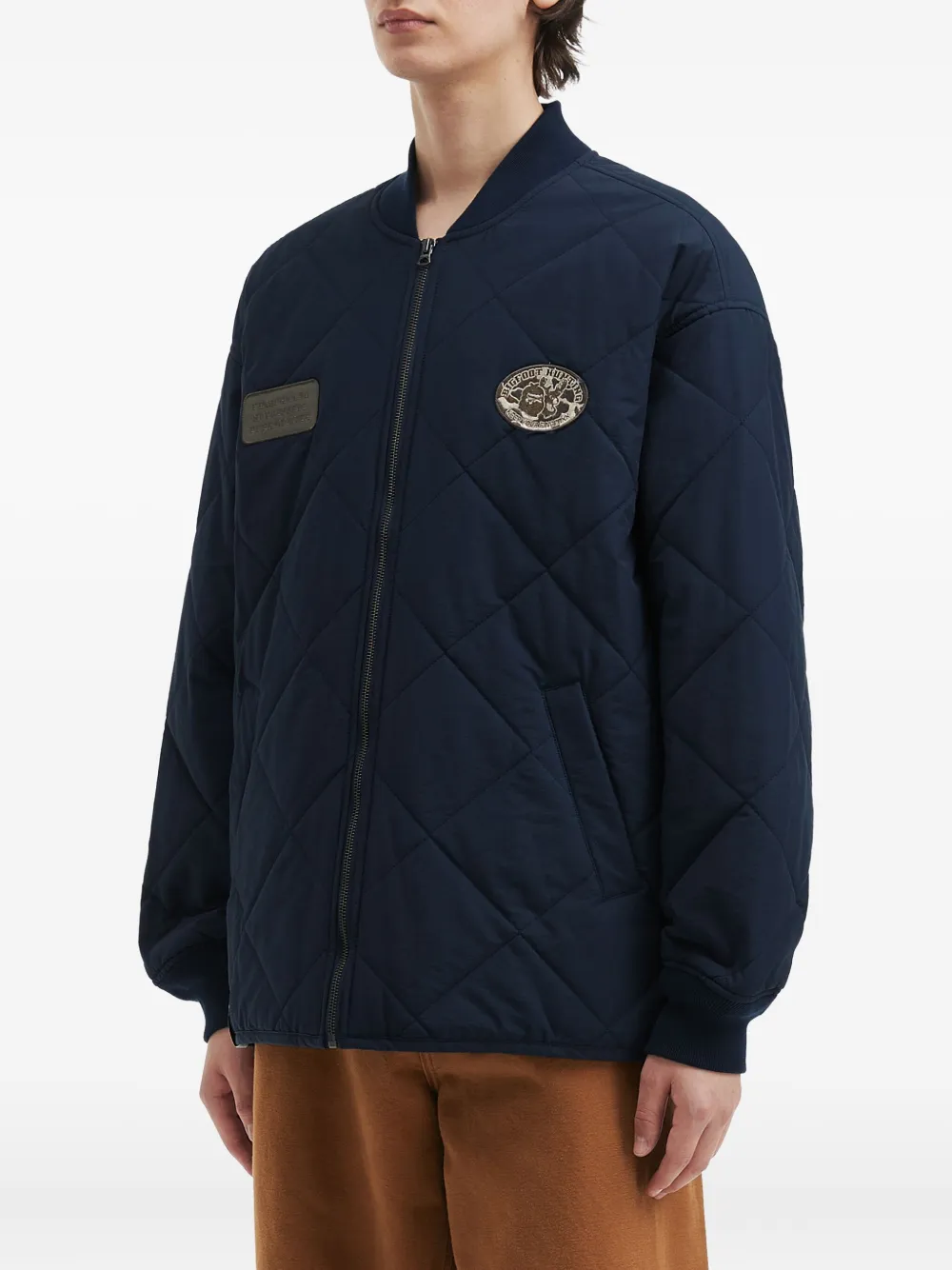 Fingercroxx Patch-detail Quilted Jacket In Blue