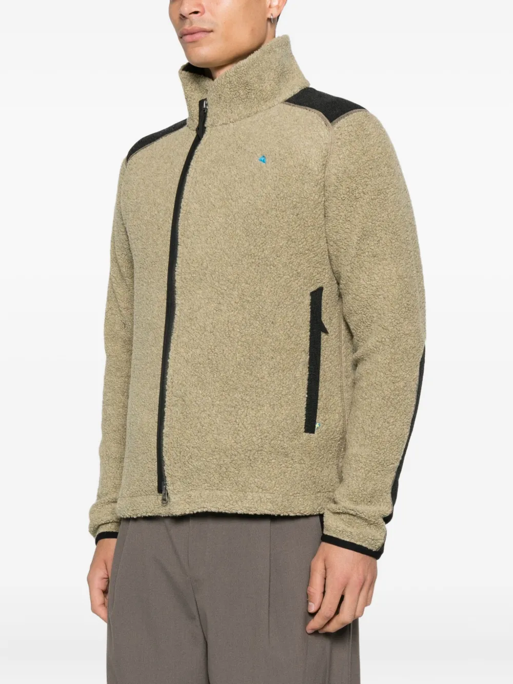 Klättermusen Jack met rits en schoudervlak Beige