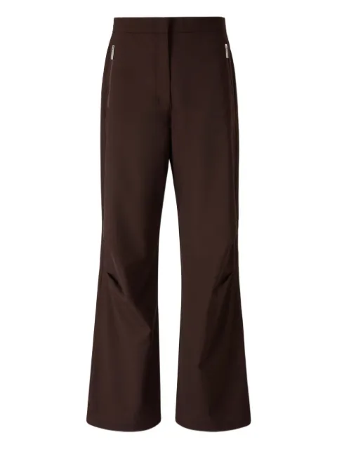 Laminar pantalones acampanados con bolsillo con cremallera