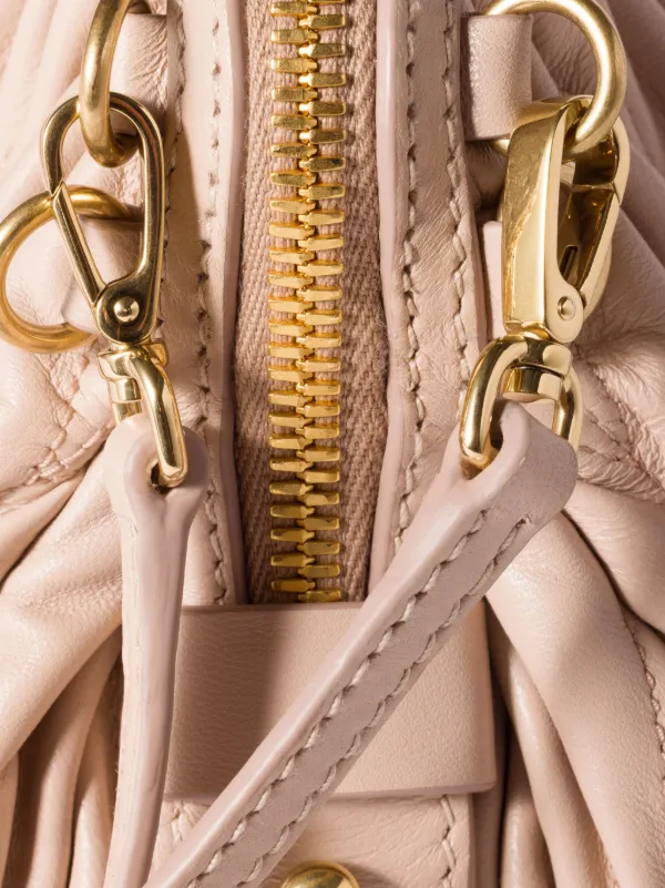 Miu Miu Matelassé Leather Clutch Bag | Pink | FARFETCH JO