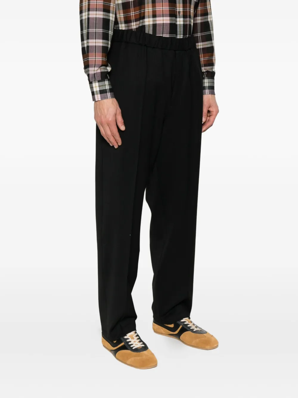 Seven Gauge Relaxed Wide-leg Trousers With Tapered Hem In Black