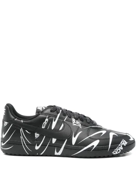Black Comme Des Garçons graphic print trainers