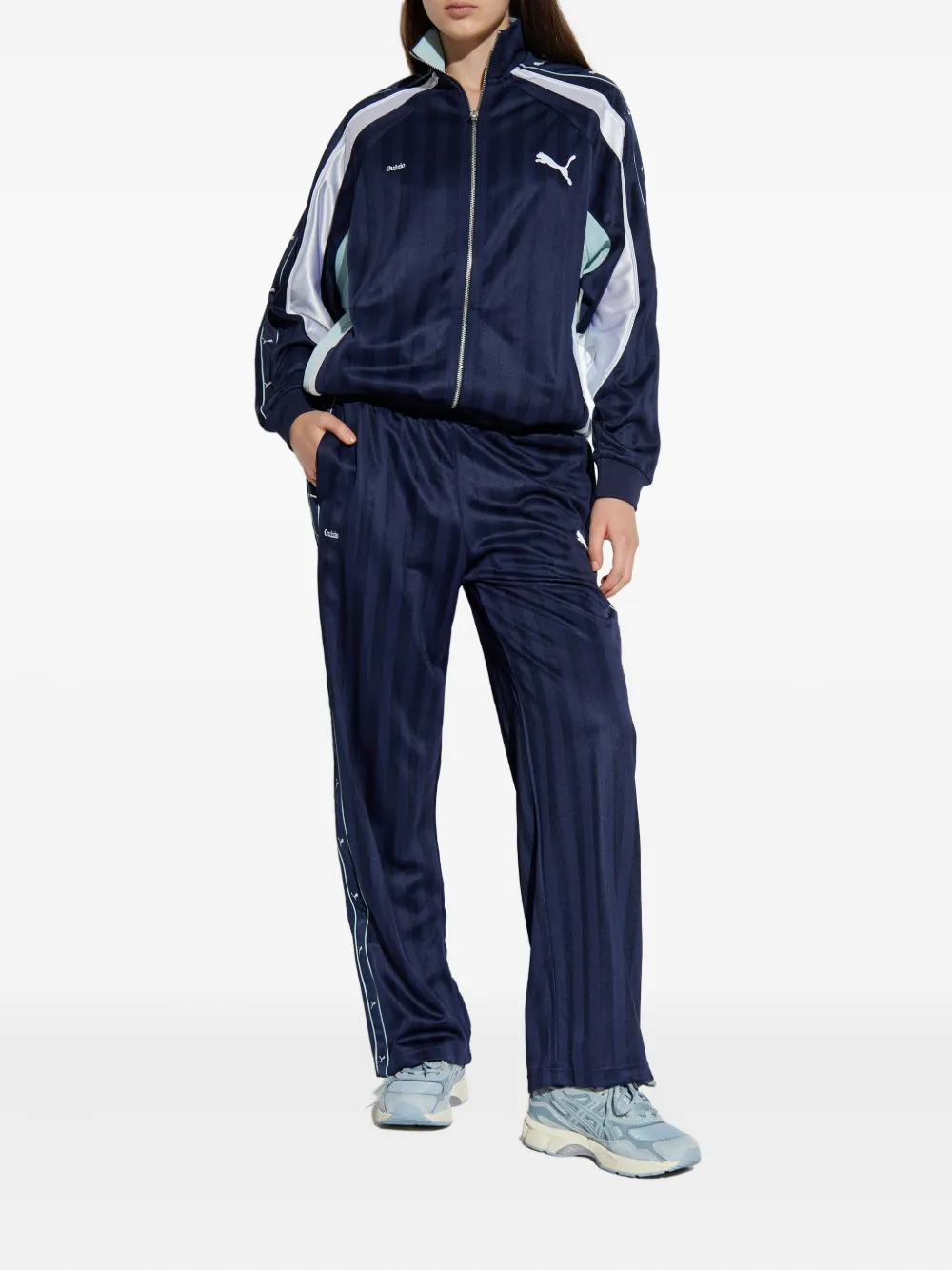 PUMA x Guizio striped logo-print pants - Blauw