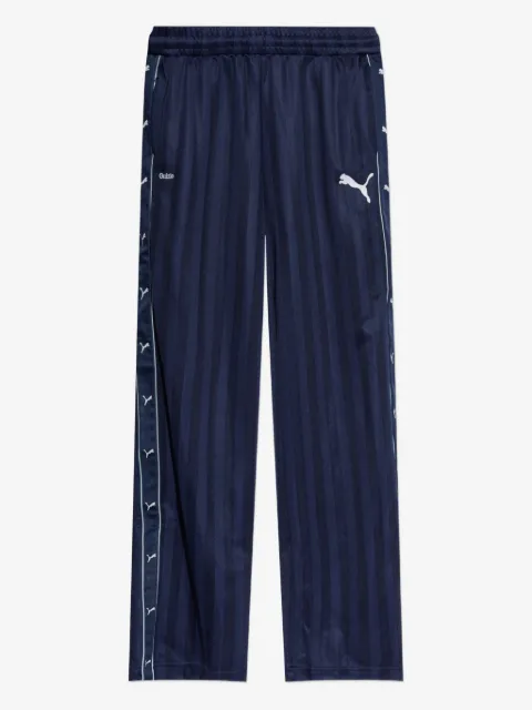 PUMA x Guizio randiga byxor med logotyp