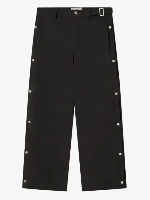 Carrer pantalones con botones de presión