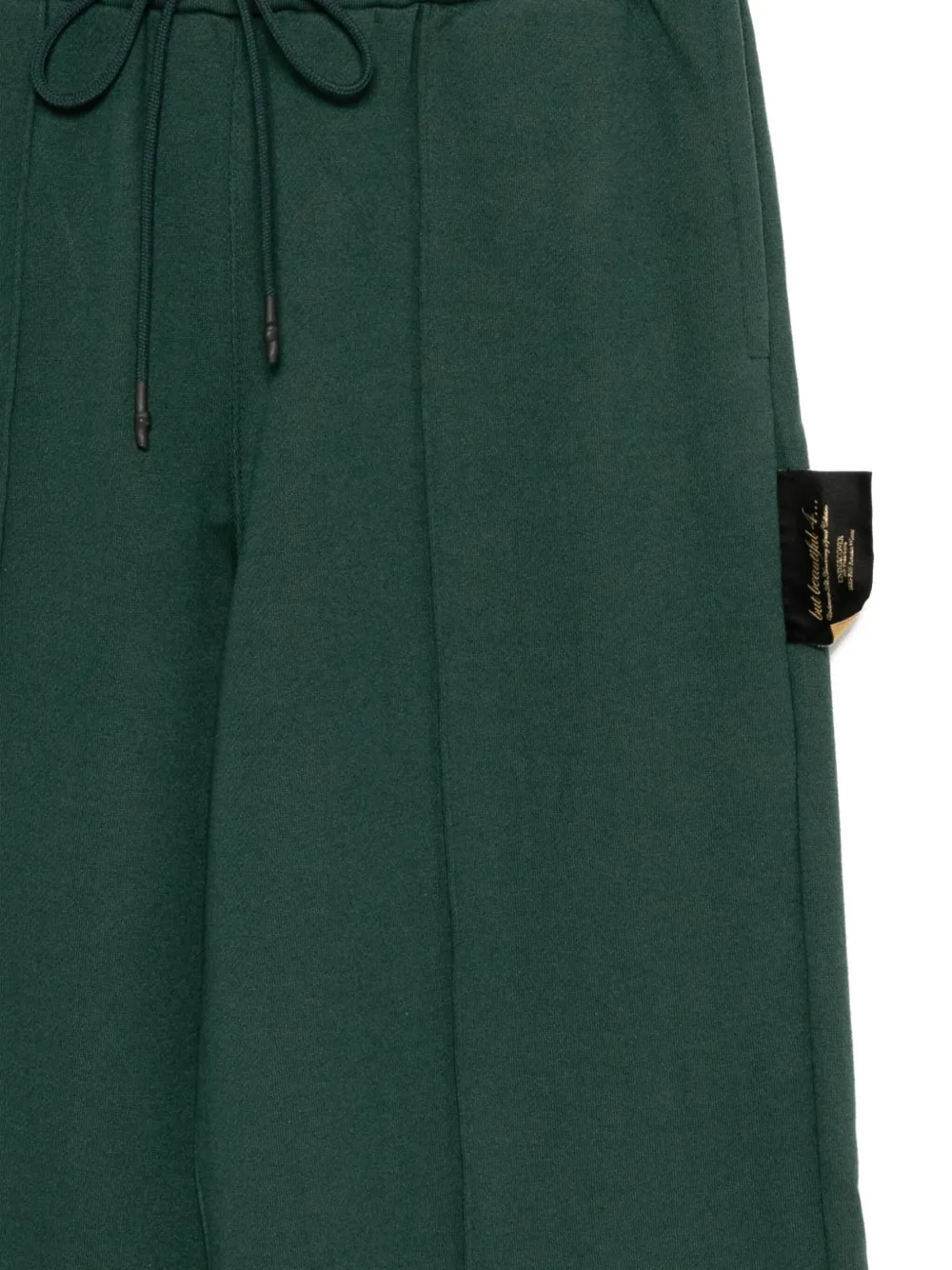Undercover Slogan-patch Trousers In Green