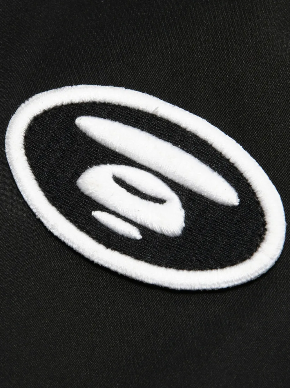 AAPE BY *A BATHING APE Jack met camouflageprint en capuchon Zwart