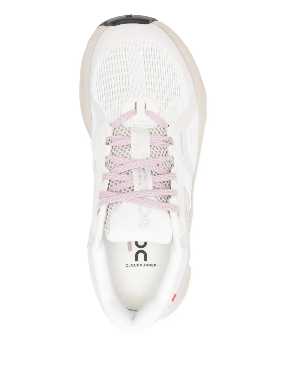 On Running Perforated Trainers In White