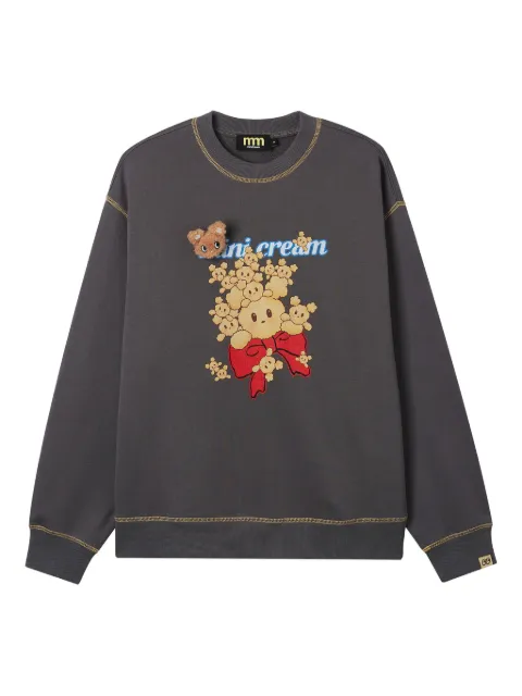 Mini Cream sudadera con aplique gráfico