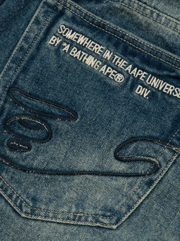 AAPE BY *A BATHING APE® Elasticated logo-patch Jeans | Blue | FARFETCH
