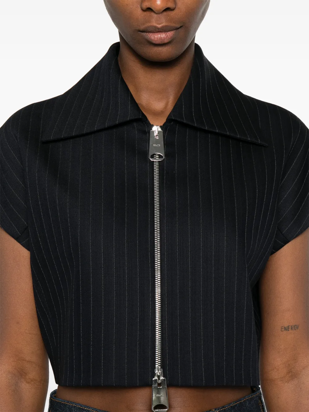 KHAITE Robin blouse met rits Zwart