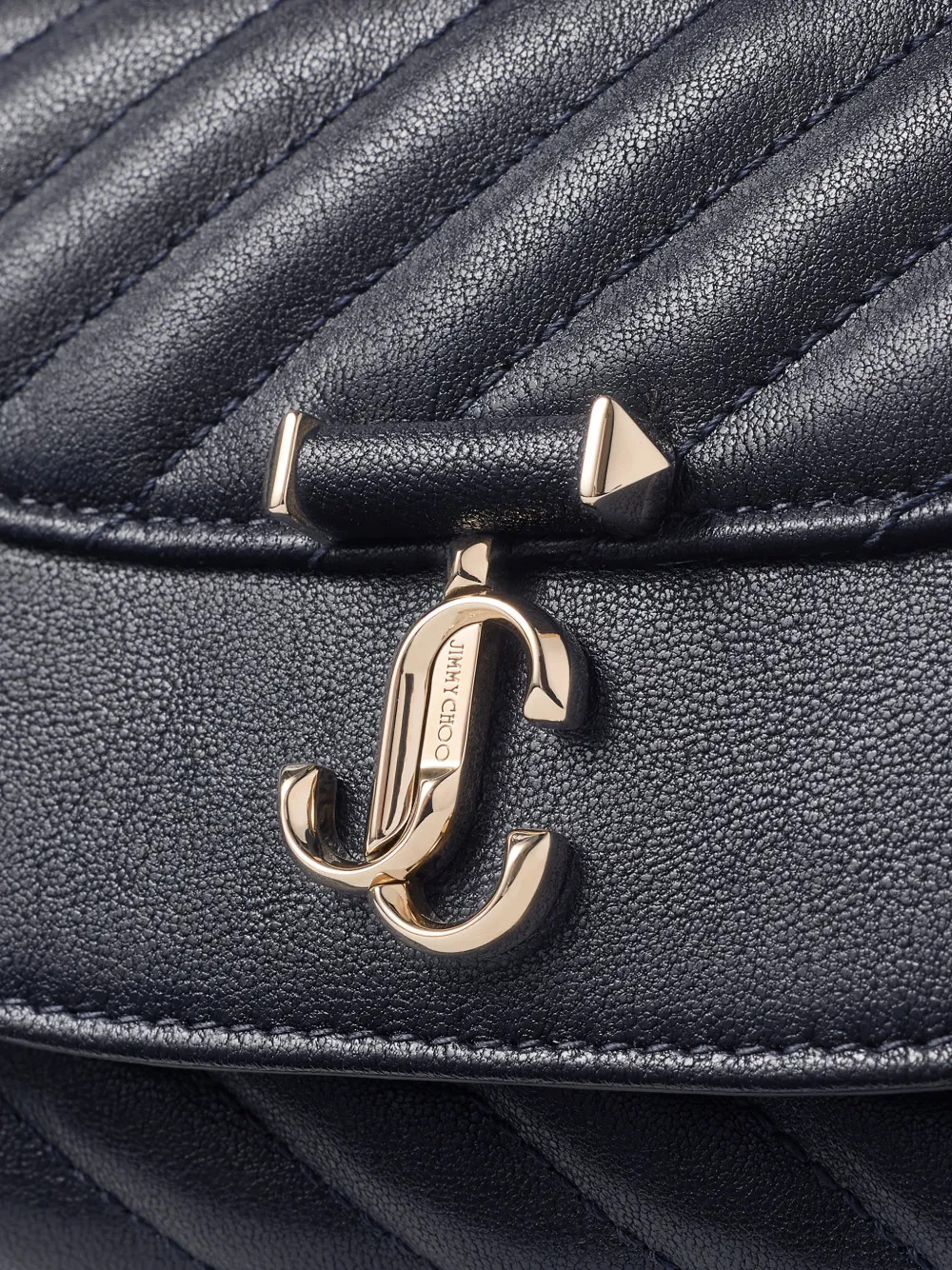 Jimmy Choo Kleine Curve gewatteerde crossbodytas met logo-plakkaat Blauw