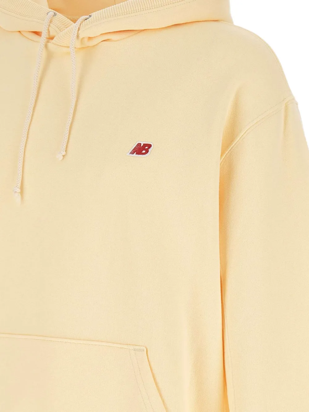 New Balance Hoodie met trekkoord en buidelzak Beige