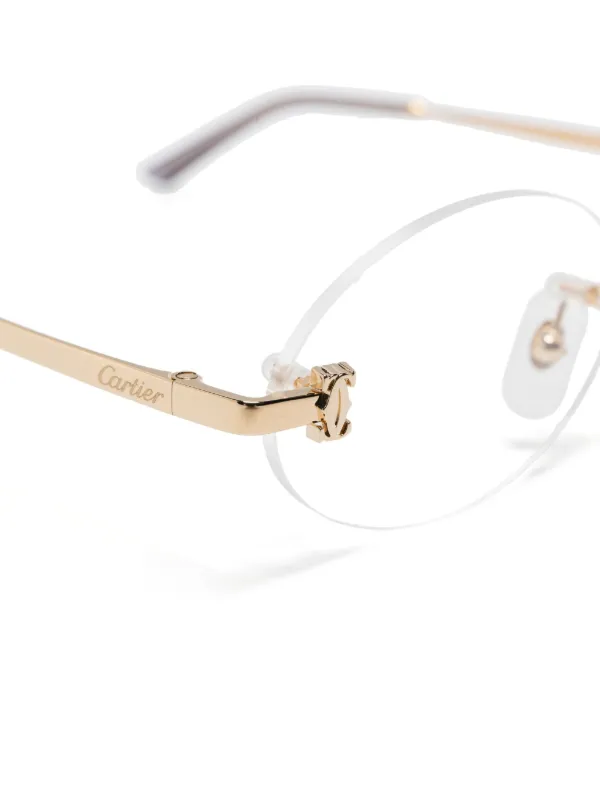 Cartier Eyewear オーバルメガネフレーム | イエロー | FARFETCH JP