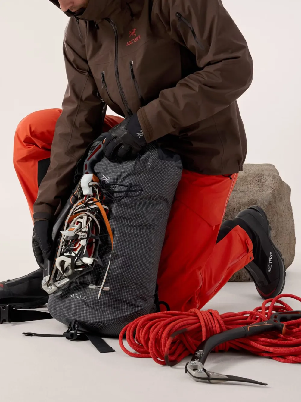 Arc'teryx Alpha Sv Hooded Zip-up Jacket In Brown