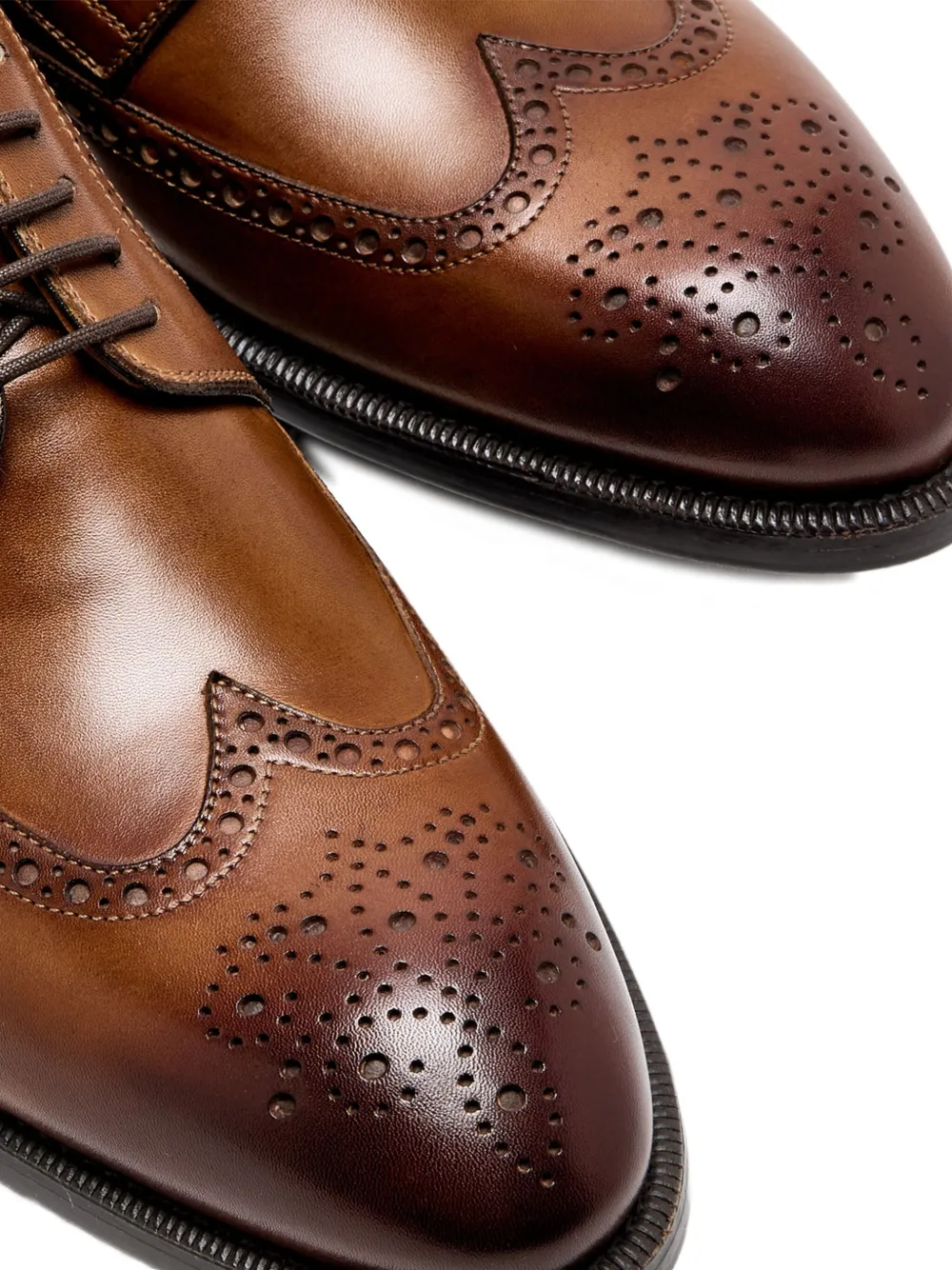 Magnanni Derby schoenen verfraaid met perforaties Bruin