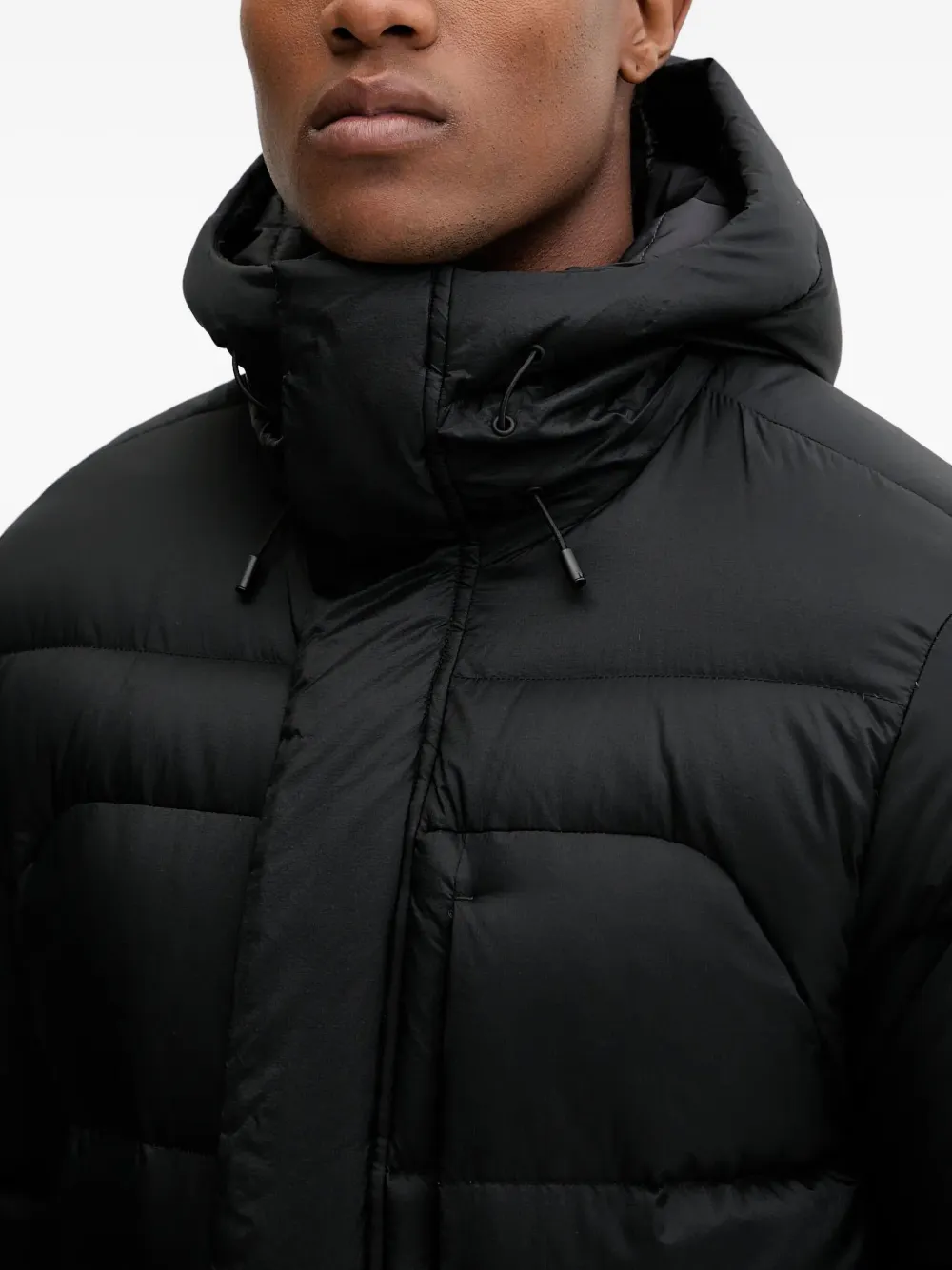 JACK WOLFSKIN Icy Hill gewatteerd jack met capuchon Zwart