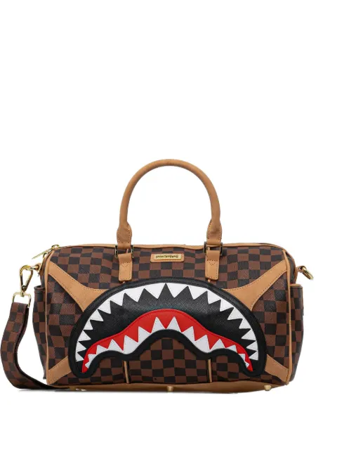 Sprayground checked-pattern luggage bag