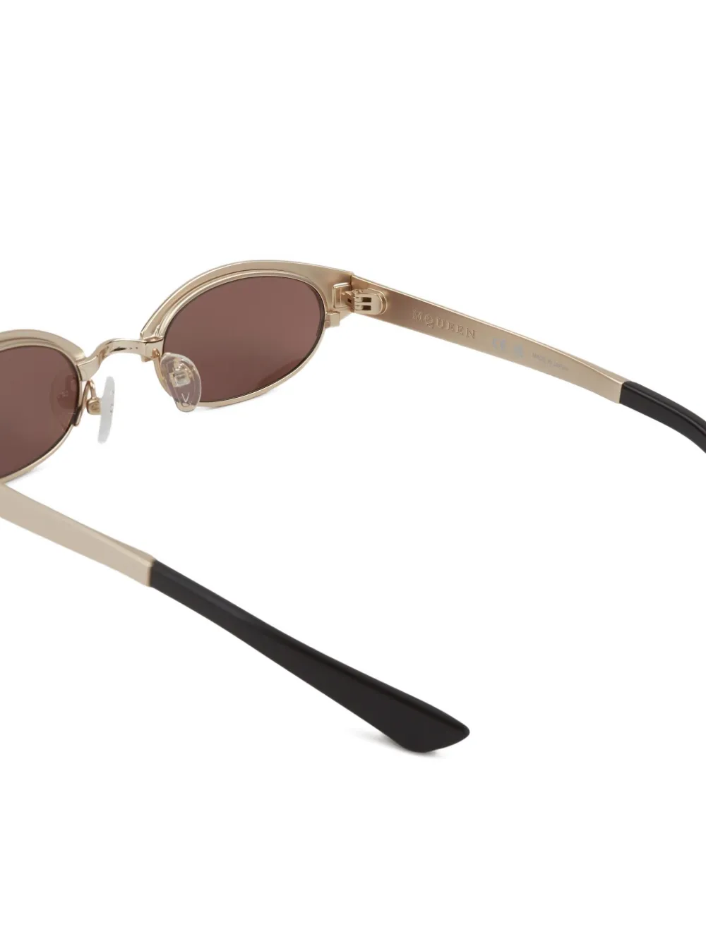 Alexander McQueen Ellipse zonnebril met ovalen montuur Goud
