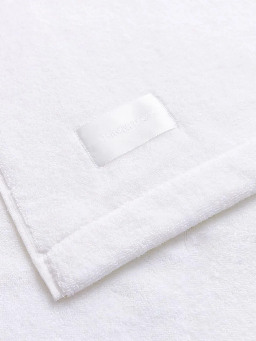 Magniberg embossed towel | Towels & Bath Robes | Image 2