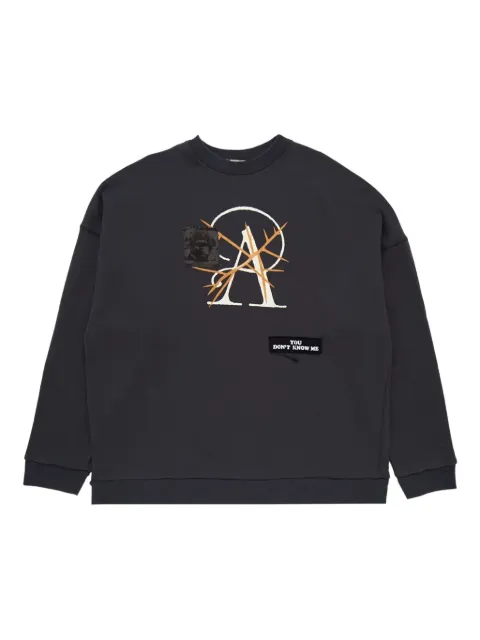 Undercover sudadera con apliques