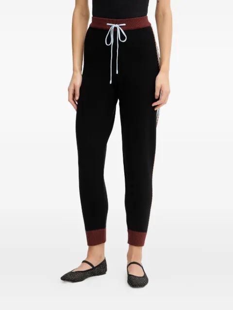 NEVER FULLY DRESSED drawstring palm tree track pants