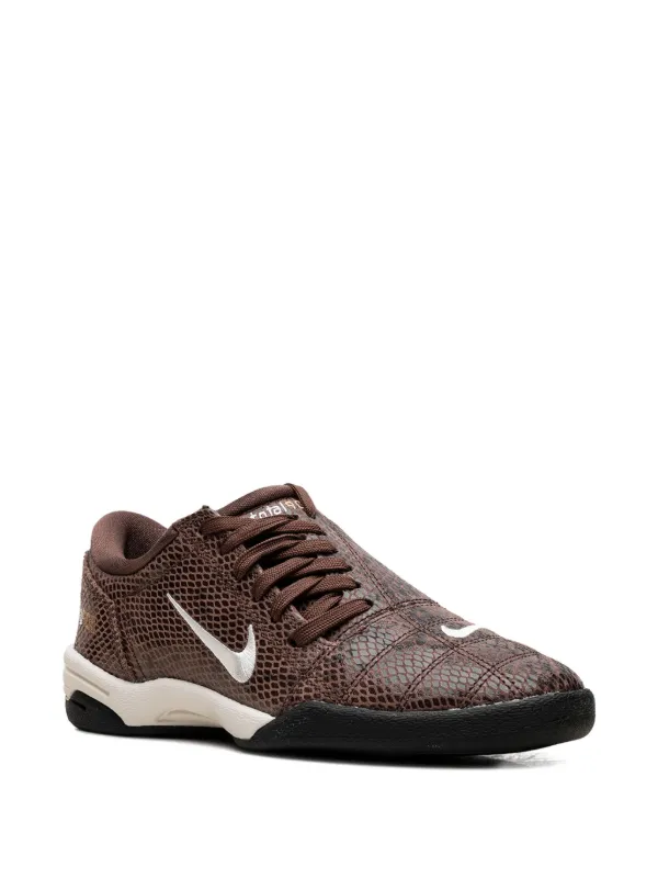 snake print nike trainers