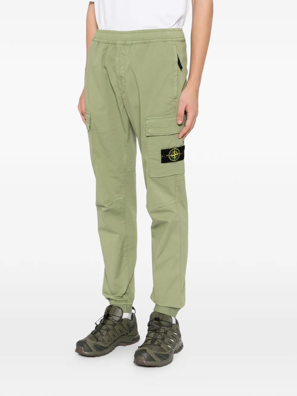 Stone Island Pantalone trainingsbroek met toelopende pijpen Groen