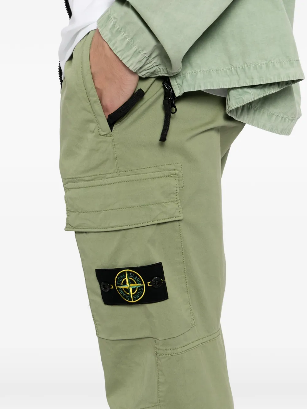 Stone Island Pantalone trainingsbroek met toelopende pijpen Groen