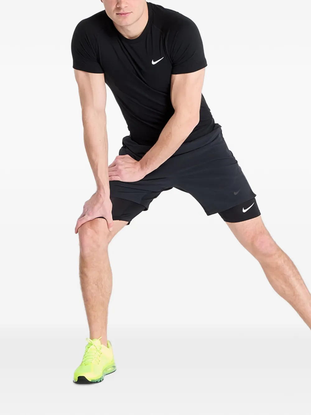 Nike Dri-FIT long shorts Geel