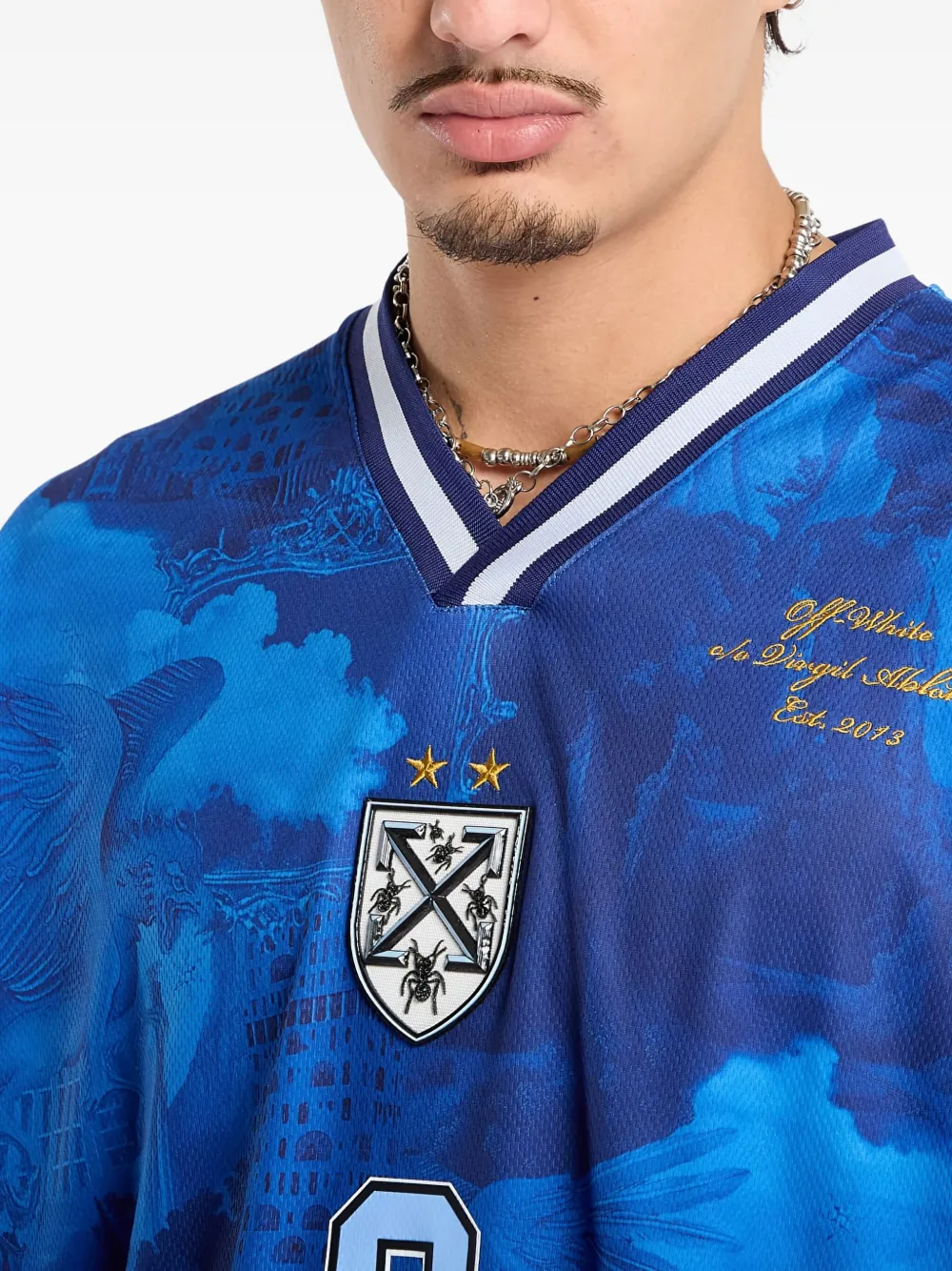 Off-White T-shirt met V-hals Blauw