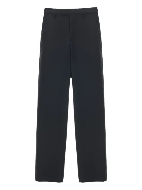 Rier pantalones con bolsillos