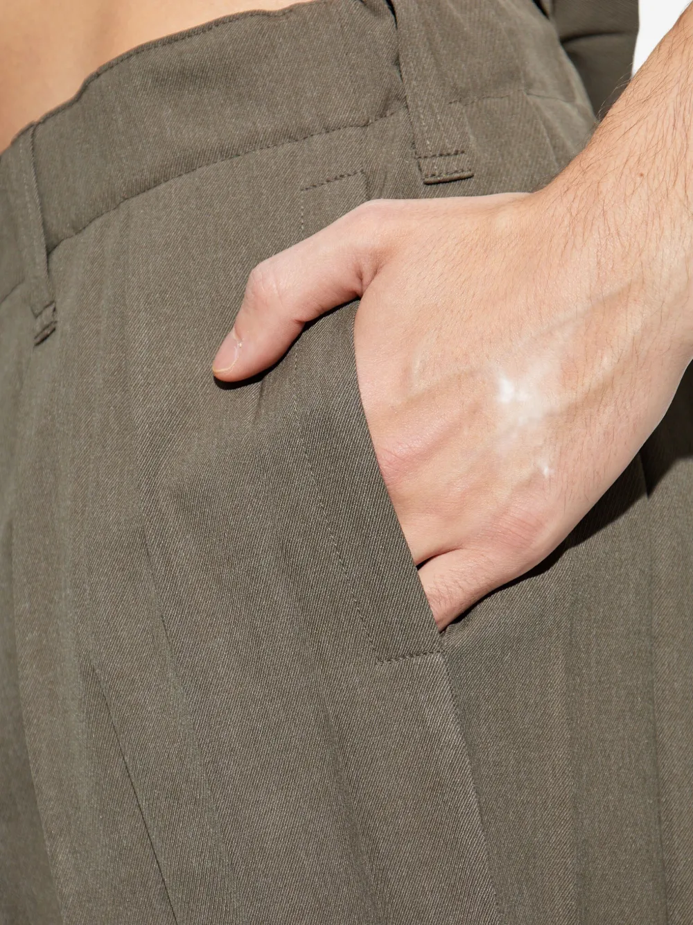 Homme Plissé Issey Miyake Geplooide broek Groen