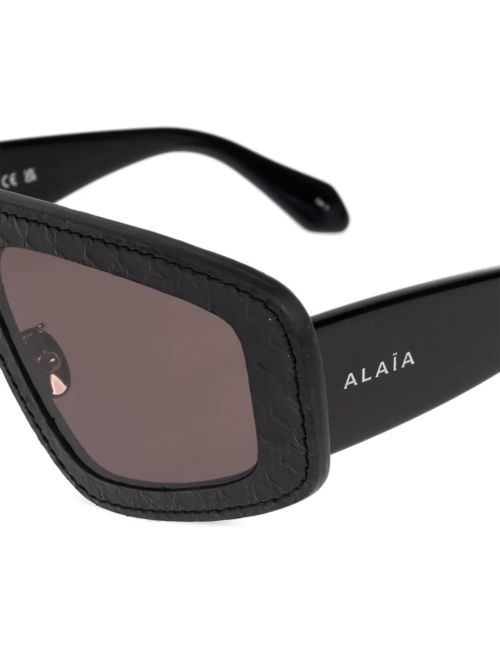 Alaia Eyewear Zonnebril met rechthoekig montuur en textuur Zwart