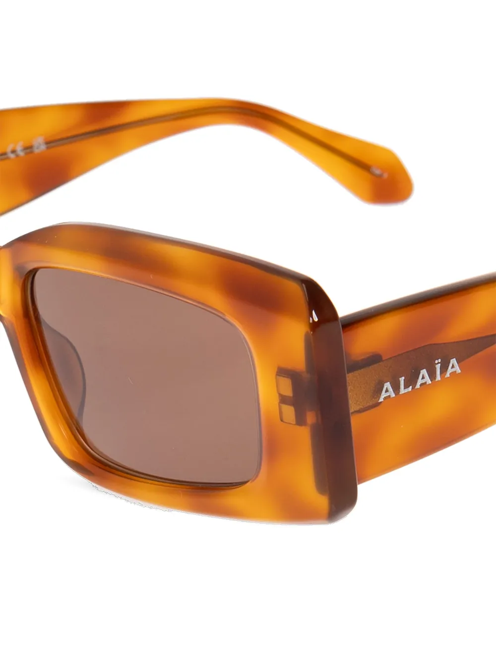 Alaia Eyewear Zonnebril met rechthoekig montuur Bruin