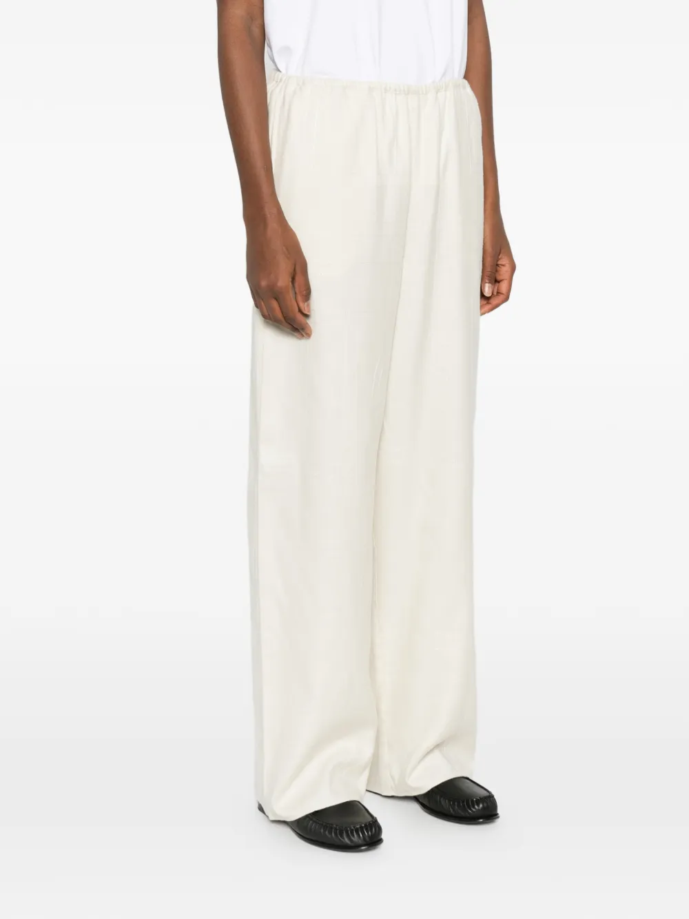 TOTEME Broek met monogram-print Beige