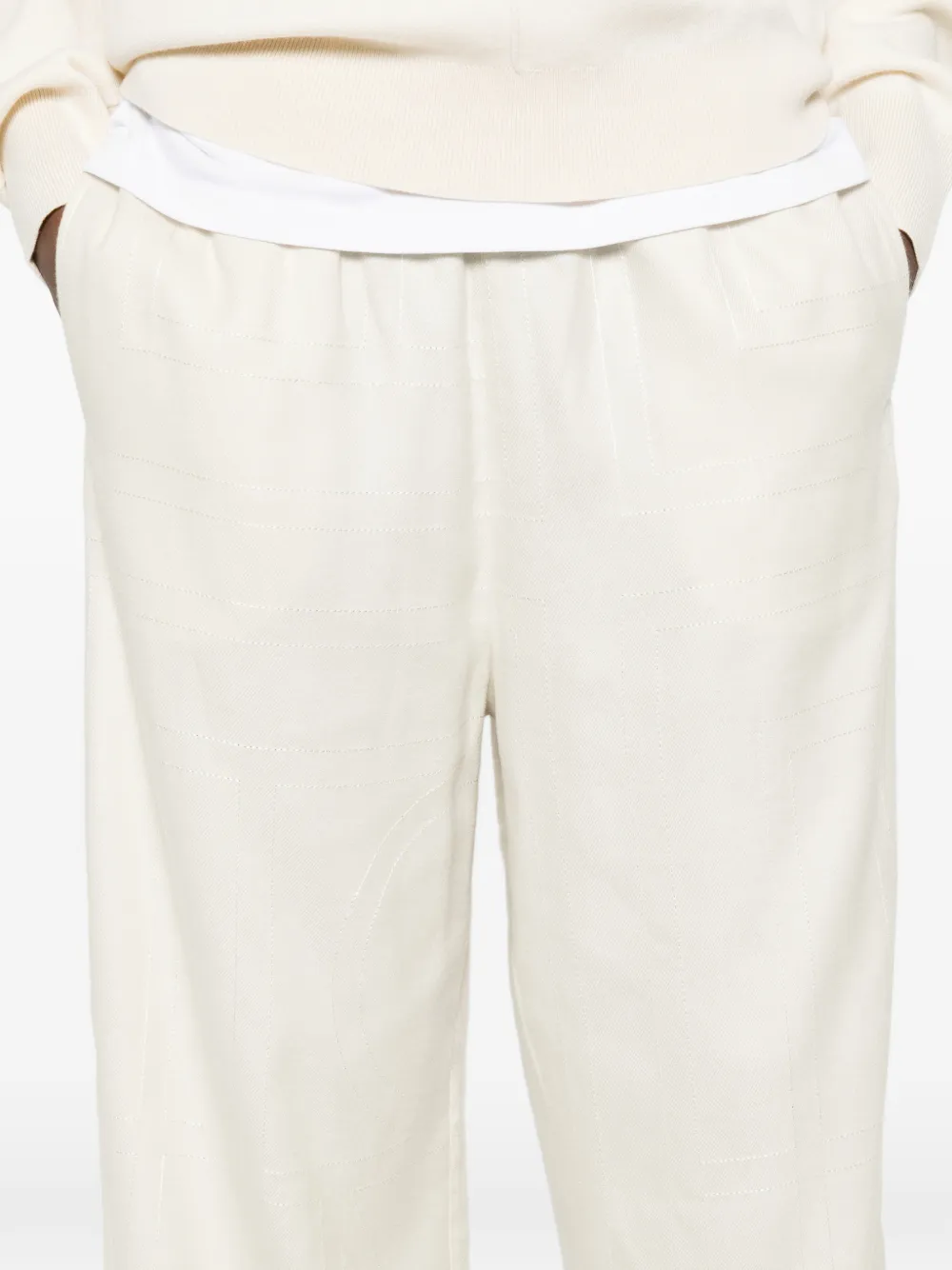 TOTEME Broek met monogram-print Beige
