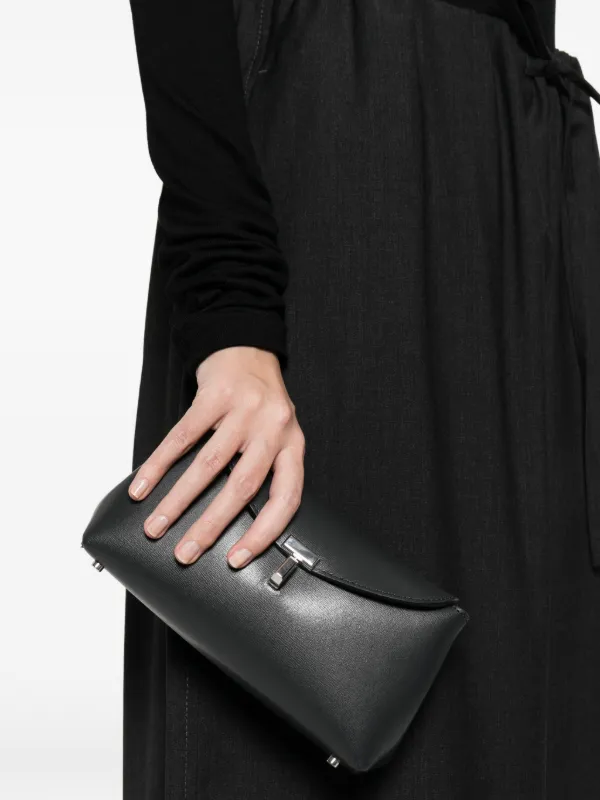 TOTEME Mini T-lock Leather Clutch Shark | Blue | FARFETCH