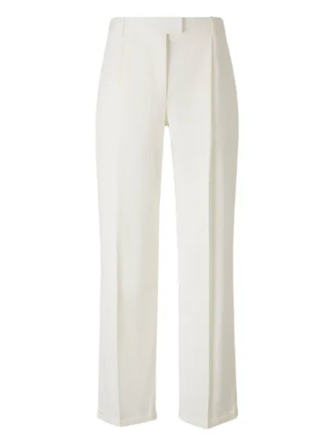 The Row flared trousers